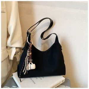 Black suede shoulder bag for women, large capacity vintage hobo handbag with cute pendant.