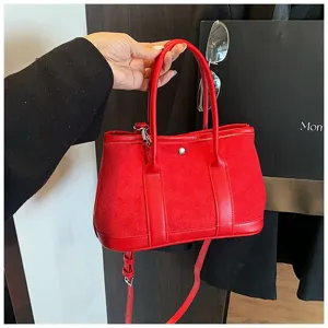 Red suede patchwork handbag detail, stylish top handle crossbody bag for women autumn.