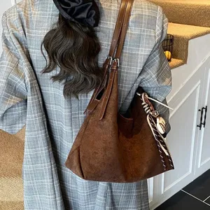 Autumn winter large capacity retro suede shoulder bag for women, casual commuting brown hobo tote.