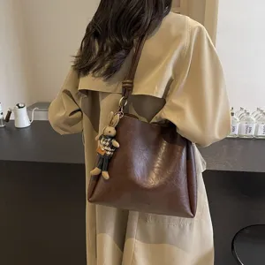 Stylish autumn winter large capacity brown leather shoulder bag bucket bag with cute rabbit charm
