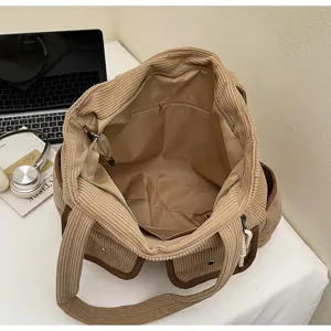 Casual corduroy contrast color tote bag with multiple practical pockets for daily use.