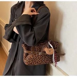 Leopard print shoulder bag detail view, casual handbag with bear pendant for daily commute.
