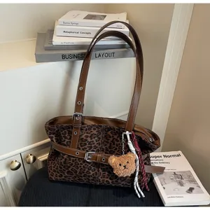 Casual leopard print tote bag with brown leather straps and cute bear pendant for women.