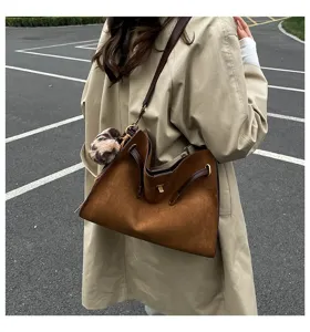 Retro suede tote bag for women, large capacity shoulder bag with stylish lock and strap details.