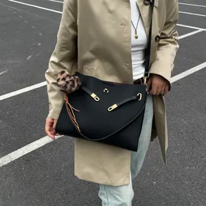 Retro matte black tote shoulder bag for women, large capacity stylish commuting messenger bag.