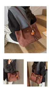 Korean style brown suede shoulder bag for women, commuter tote with flap and cute tassel charm.