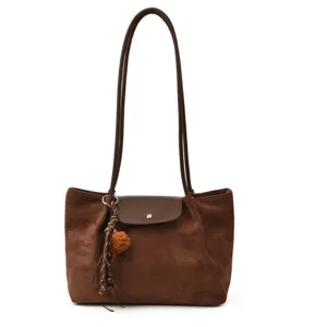 Brown suede shoulder bag for women, large capacity commuter tote with flap and long straps.