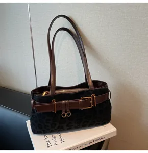 Retro leopard print suede shoulder bag detail, stylish brown leather straps and belt accent.