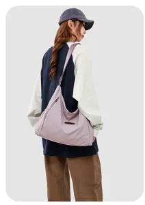 Casual minimalist canvas shoulder bag for women, large capacity stylish daily commuter tote.