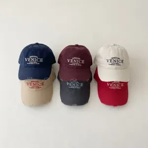 Kids retro style washed baseball cap with letter embroidery, comfortable casual sun hat for boys and girls.