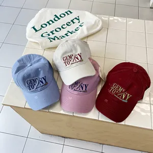 Detail view of casual distressed embroidered baseball caps in multiple colors for kids daily wear.