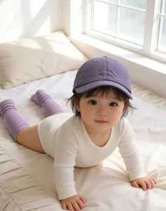 Detailed shot of Korean style solid color quick-drying baby baseball cap, breathable sun hat.