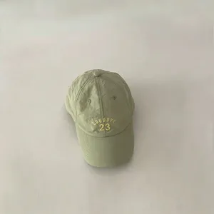 Detailed close-up view of lightweight quick-dry kids baseball cap with embroidery.