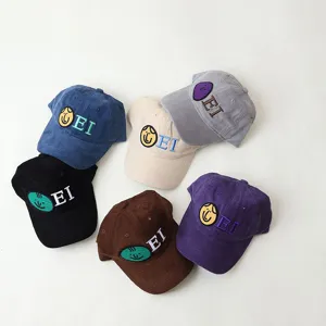 Children's autumn winter corduroy baseball cap with cute embroidered letters and smiley face.