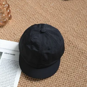 Black quick-dry solid baseball cap detail, breathable fabric and neat stitching, casual outdoor.