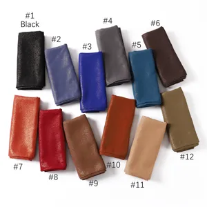 Closeup details of sparkling glitter chiffon Malay long scarves in multi colors for women.