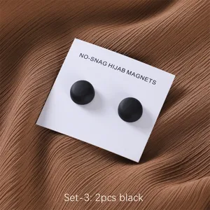 Matte black magnetic hijab pins detail shot, strong clasp for scarves, shawls, and daily wear.