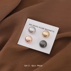 Round metal magnetic hijab pins set of four pieces in various metallic colors for women.