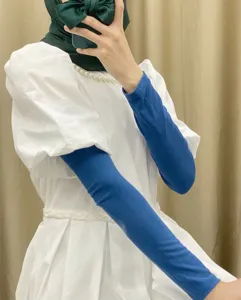 Comfortable blue arm sleeves for sun protection and daily wear, soft and breathable fabric.