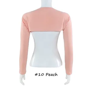 Vue détaillée des manches de protection solaire en modal pêche, tissu doux et coupe confortable.