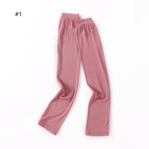 Close-up detail of soft pink modal cotton sun protection sleeves, smooth fabric.