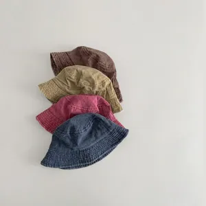 Details of kids washed cotton bucket hat in multiple colors, soft fabric for spring and autumn daily wear.