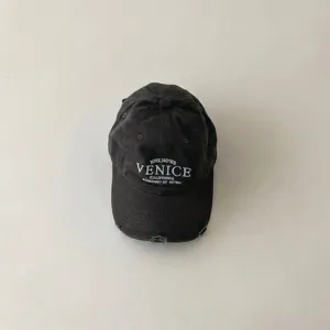 Kids vintage washed baseball cap with embroidered letters, stylish autumn sun protection hat.