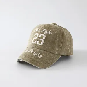 Vintage washed embroidered baseball cap detail, featuring chic number and letter embroidery.
