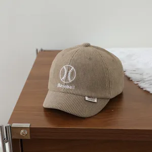 Detailed close-up view of the cute corduroy baby baseball hat with nice embroidery details.