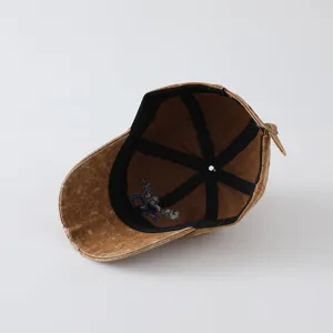 Vintage washed cotton baseball cap with inner structure detail, adjustable metal buckle.