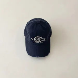 Trendy kids baseball cap with vintage embroidered letters, washed dark blue cotton sun hat.