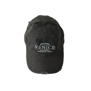 Kids retro washed black baseball cap with front embroidered letters, vintage sun hat style.