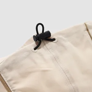Kids beige beret melon cap detail shot, casual solid color cotton hat with adjustable cord.