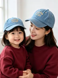 Classic denim baseball cap for kids and mom, trendy embroidered design, comfortable daily wear.