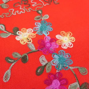 Embroidery cashmere-like scarf detail, colorful plum floral pattern, warm winter shawl.