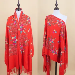 Red faux cashmere embroidered shawl, ethnic floral design, warm tassel winter scarf detail.