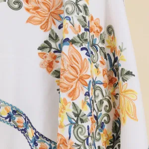 Exquisite ethnic embroidered floral cashmere feel shawl scarf, detailed close up white wrap.