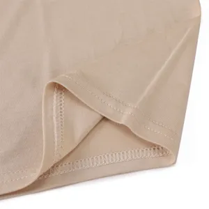 Close-up of soft modal fabric cap hem with neat stitching, showing smooth texture and elasticity.