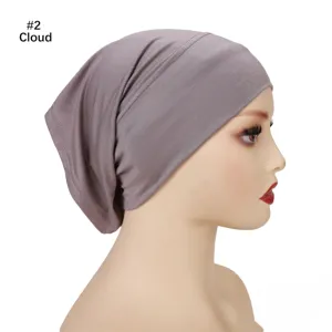 Solid color modal hijab cap detail view, showing soft stretchy fabric and comfortable fit side profile.