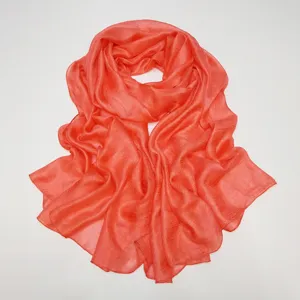 Coral crinkled solid color scarf soft breathable lightweight hijab shawl for women daily wear.