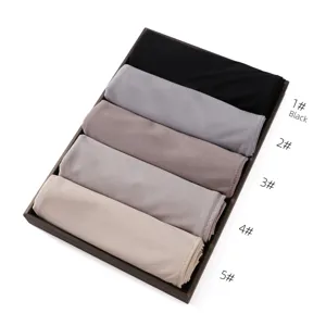 Detail view of soft stretch jersey hijab scarf, breathable solid color modal head wrap.
