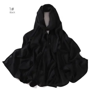 Solid black elastic jersey hijab scarf for women, soft breathable Muslim head wrap.