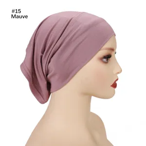 Solid modal hijab under cap detail view, showing soft breathable fabric and stretchy fit in mauve.
