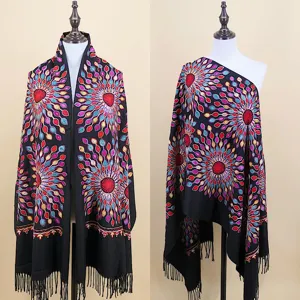 Detailed view of black ethnic embroidered shawl with vibrant colorful sunflower pattern.