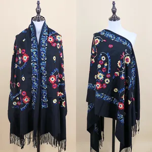 Detail view of women's autumn winter embroidered imitation cashmere shawl with ethnic floral.
