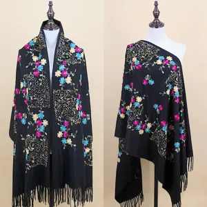 Black embroidered cashmere-feel shawl scarf with colorful floral details and fringe hem.