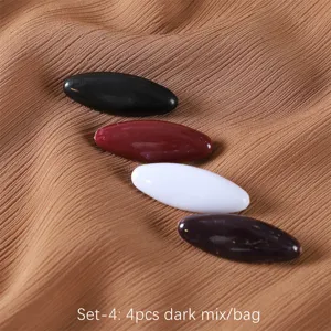 Vue detaillee de 4 epingles de hijab en plastique melange sombre, pinces pour foulard.