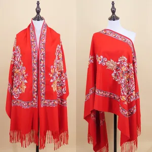 Detailed view of red imitation cashmere embroidered women shawl ethnic style winter warm scarf.