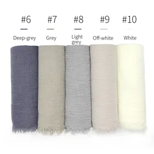 Dettagli scialle foulard stropicciato in cotone TR tinta unita con frange colorate.