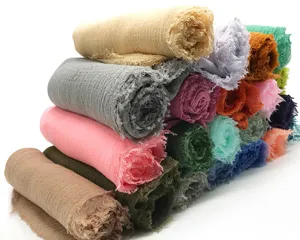 Soft solid color crinkle scarf with fringe, breathable lightweight hijab shawl for women daily wear.